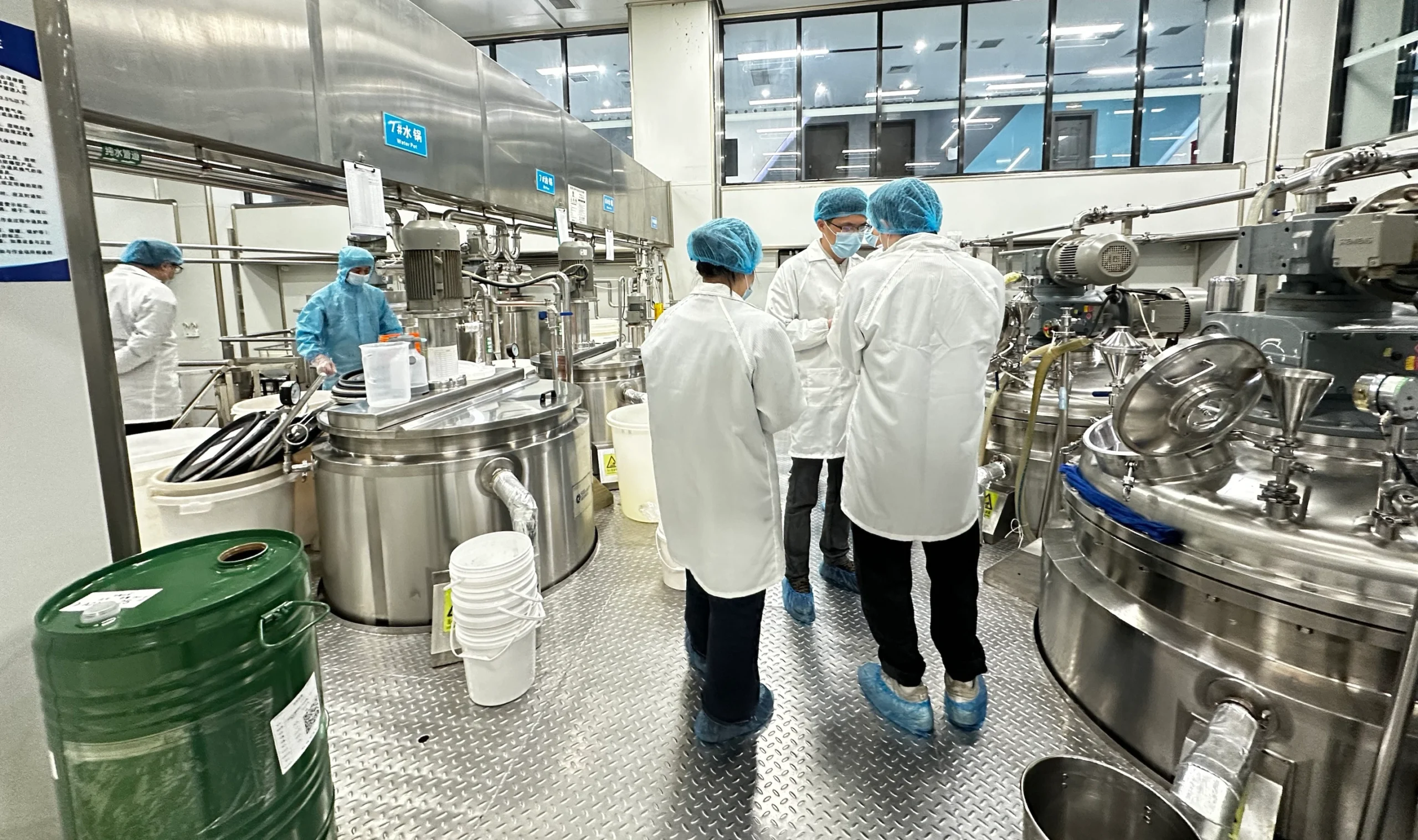 cosmetic chemists mixed a batch of peptide anti-aging serum cosmetic chemists mixed a batch of peptide anti-aging serum